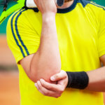 Male athlete with symptoms of tennis elbow.